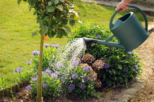 Garden waste and materials being handled in a compliant landscaping service